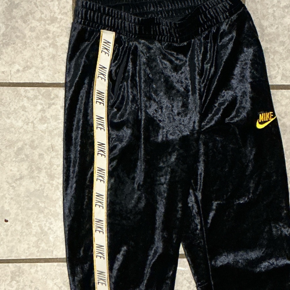 Nike Kids navy blue Joggers with Yellow Accents